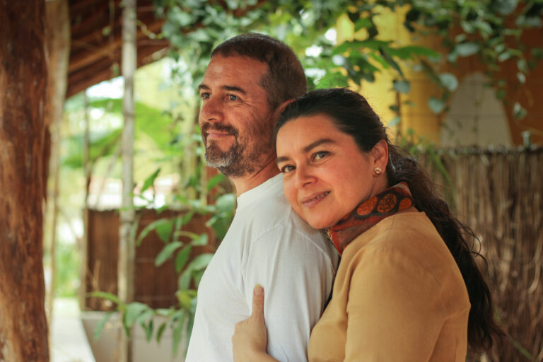 the spouse of an immigrant may receive a stimulus check like this couple hugging each other
