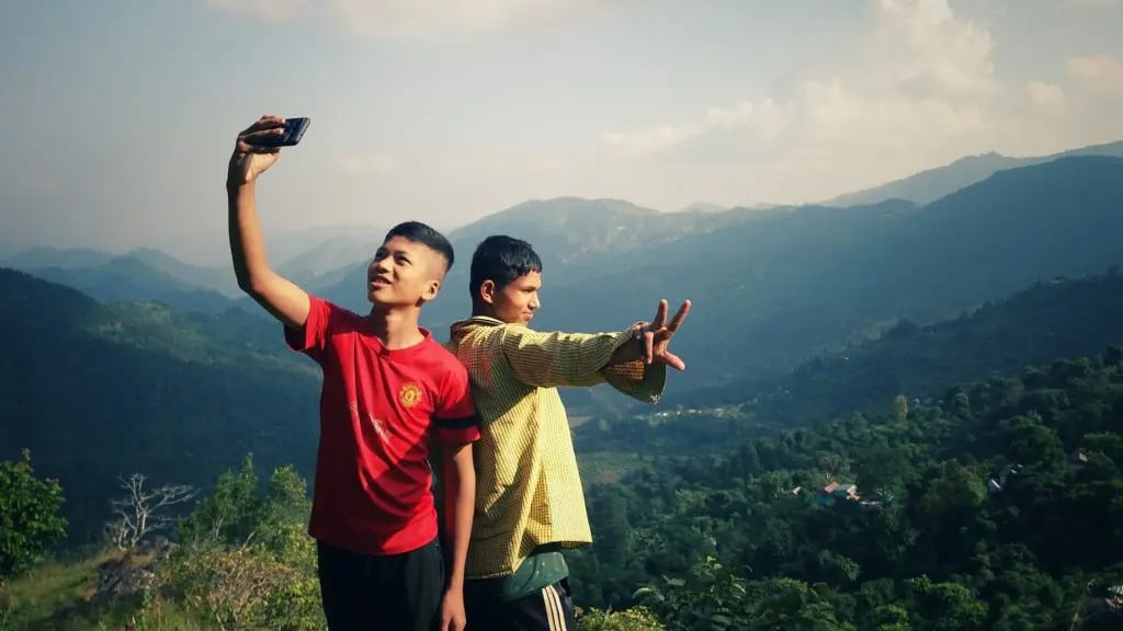 Two boys taking a picture