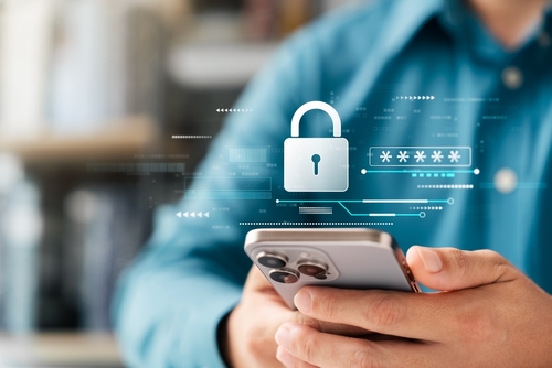 Cyber ​​security and data protection, businessman, use smartphone to encrypt security to protect from hackers.