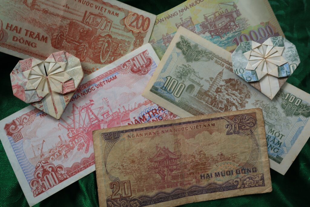 Various Vietnamese Dong and heart-shaped bills