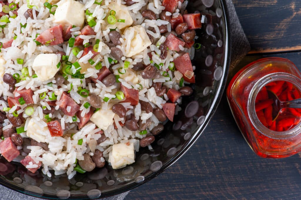 a bowl of rice with ham and beans
