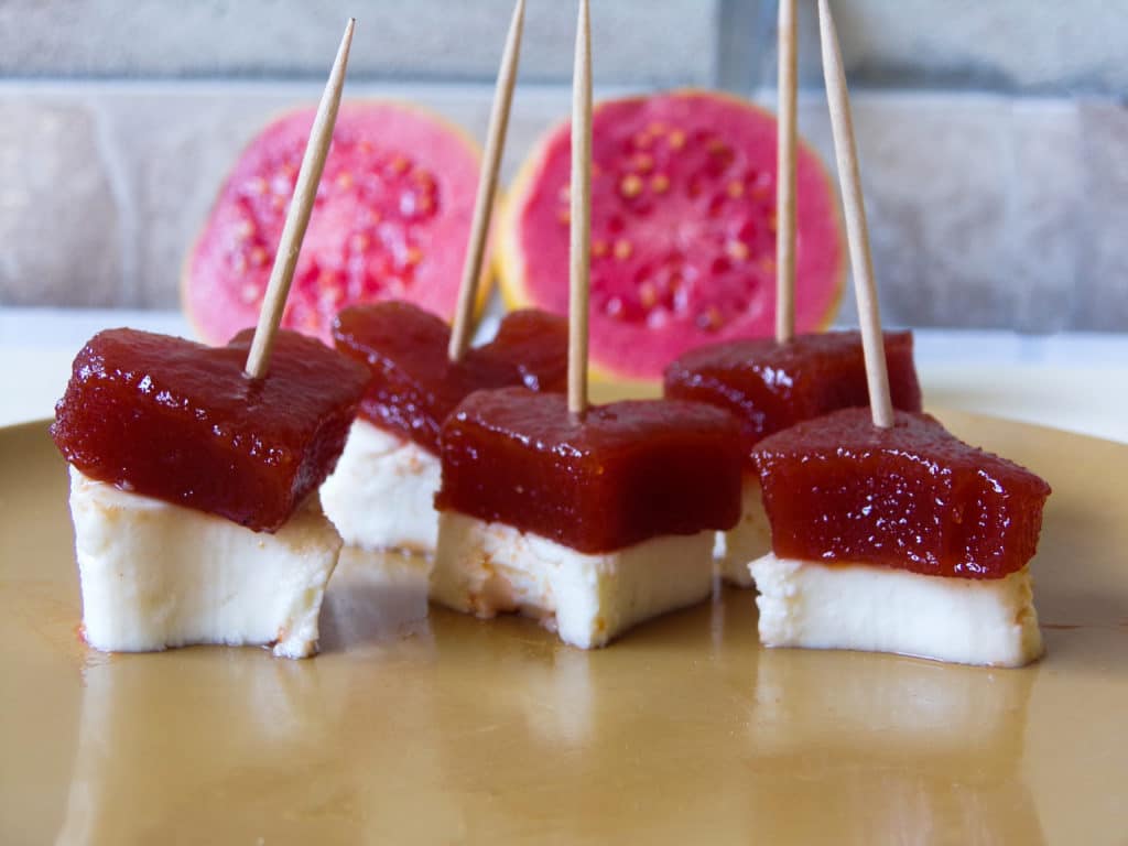 a plate with a plate of guava and cheese