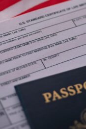 What is naturalization: U.S. flag, passport, and a document