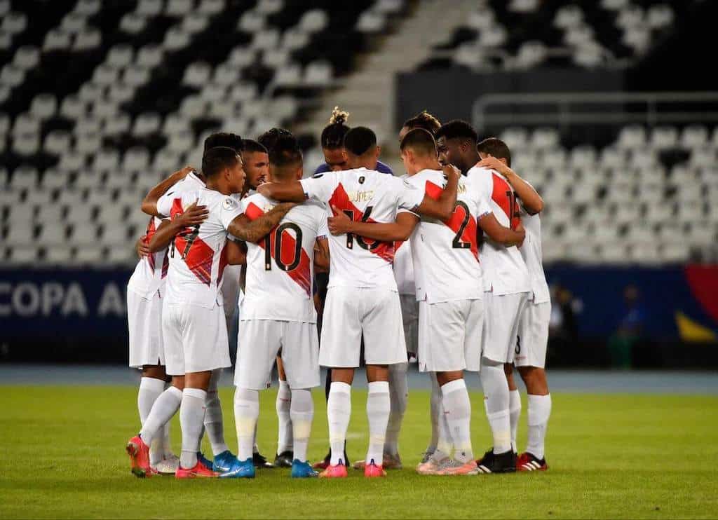 Soccer team in a huddle