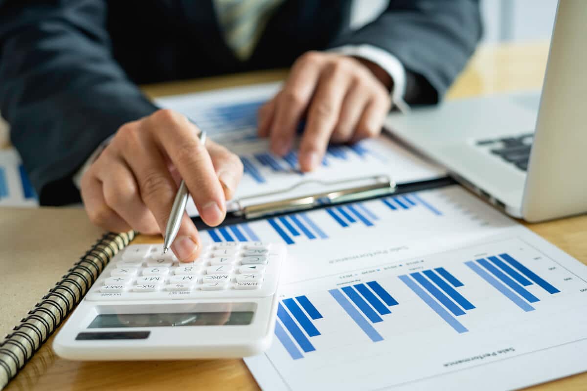 Entrepreneur calculating their sales performance