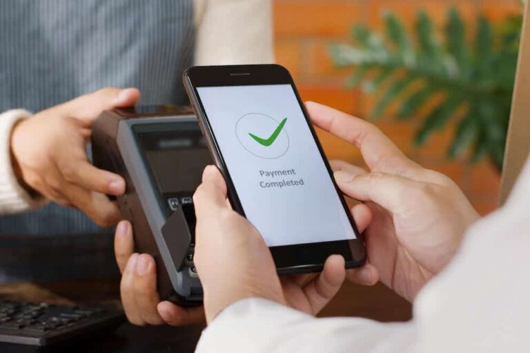 What is a digital wallet: customer using a phone to pay bills