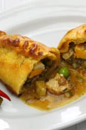 homemade saltena, empanada with a juicy filling, Bolivian breakfast