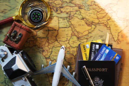 Concept of traveling overseas by plane and spending via credit card