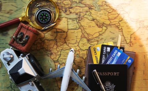 Concept of traveling overseas by plane and spending via credit card