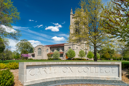 Entrance sign and Skinner Memorial Chapel on the campus of Carleton College.
