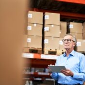 Employee checking goods at warehouse