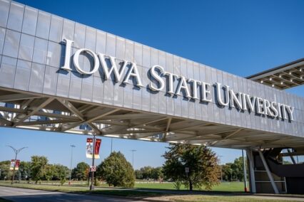Focus on logo of bridge leading to Jack Trice Stadium at Iowa State University.