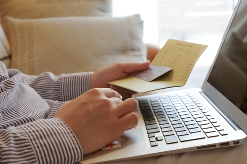 A man who enters credit card information