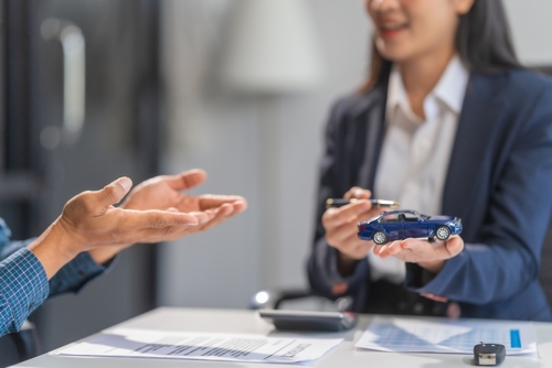 Businesswoman specializing in car loan services.