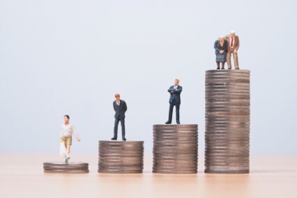 Human generation standing on the top of coins stacking include teenage Middle-Age Senior businessman and grandparent , business in investment and money saving in each generation