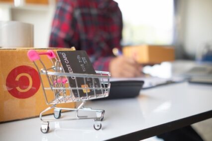 Credit card in small shopping car is a credit card that is available for online shopping for the convenience of paying for products through an online application.