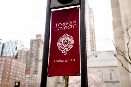 Flag pole banner at the campus of Fordham University, near Lincoln Center.