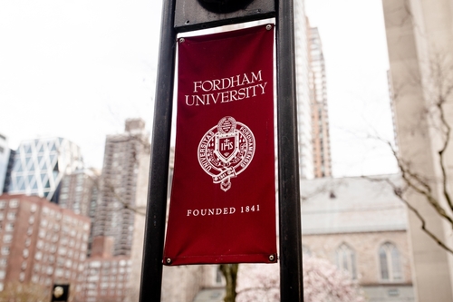 Flag pole banner at the campus of Fordham University, near Lincoln Center.