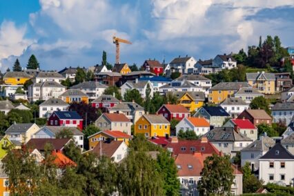 Colorful houses on a hill in Trondheim in summer.