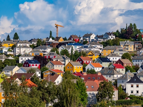 Colorful houses on a hill in Trondheim in summer.