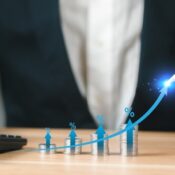 Businessman with coin, calculate high percentage of company profit dividend