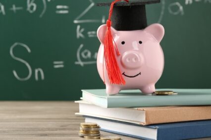Piggy bank with graduate hat