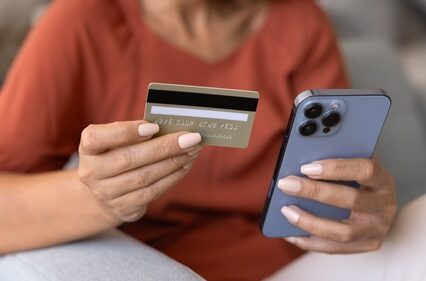 A person making financial transactions on internet application on a smartphone