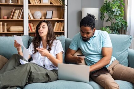 Couple reviewing household bills