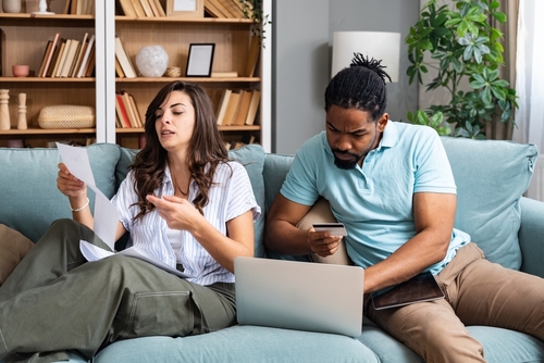 Couple reviewing household bills