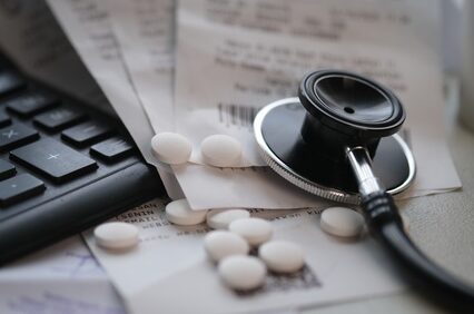 A pile of unpaid expensive hospital bills.