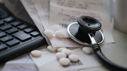 A pile of unpaid expensive hospital bills.