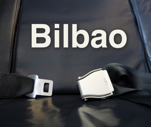 Airplane comfortable leather seat awaiting passenger for voyage.