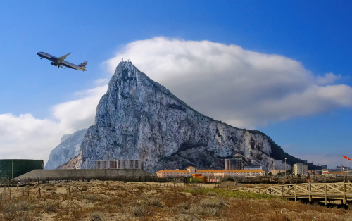 Gibraltar airport, plane taking off, Gibraltar Rock