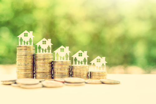 Family members in a house on rows of rising coins, depicts amount of money needed to pay / sustain certain standard of living by affording basic expenses