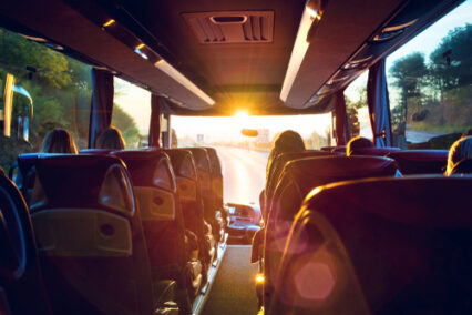 View from inside a stage coach Bus into the sunset