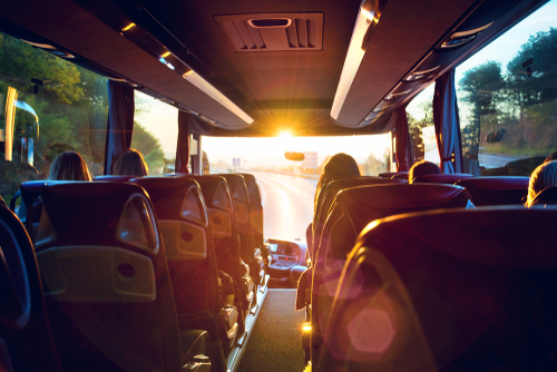 View from inside a stage coach Bus into the sunset