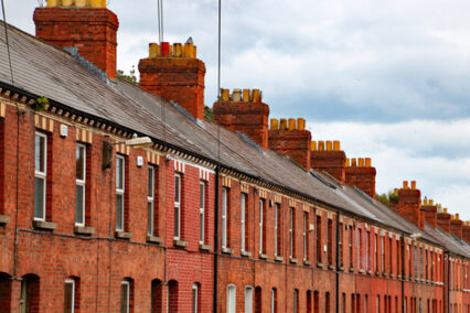 Facades and chimneys of typical city houses in Dublin, Ireland