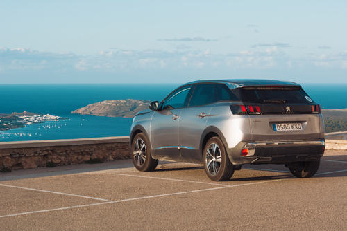 Peugeot 3008 SUV car parked on the top of El Toro Mountain on Menorca, Balearic Islands, Spain