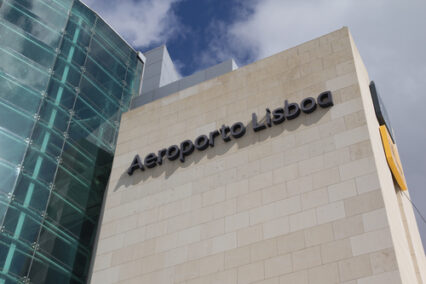 The Lisbon airport sign in front of the main entrance of the Lisbon airport.