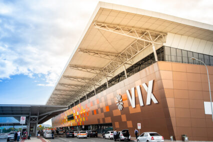 Vitoria airport facade, state of Espírito Santo, Brazil. Orange and brown mosaic with vix sign