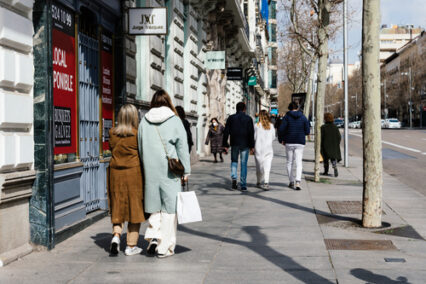 People shopping in Serrano Street. Salamanca District is well known for being one of the wealthiest areas with a high living cost and luxury shops in Madrid