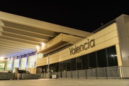 Illuminated Valencia airport building in the night.