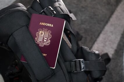 Andorra Passport on a Black Suitcase Travel Bag