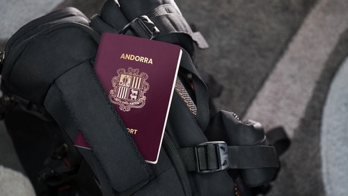 Andorra Passport on a Black Suitcase Travel Bag