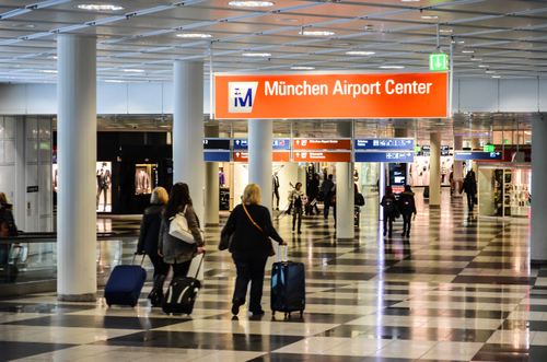 Passengers walking through Munich Airport Center