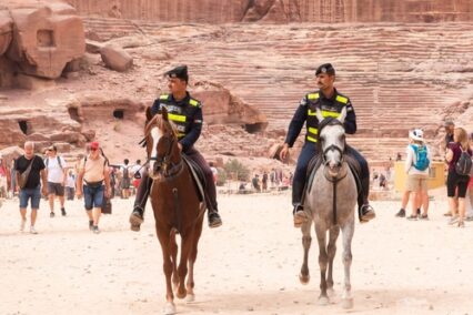Mounted Jordanian police patrol along entire tourist route in Nabatean Kingdom of Petra in the Wadi Musa city in Jordan