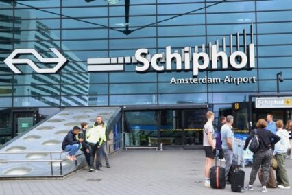 entrance of departure and arrival hall of Amsterdam Schiphol airport