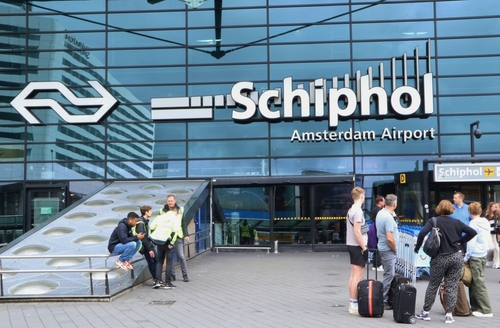 entrance of departure and arrival hall of Amsterdam Schiphol airport