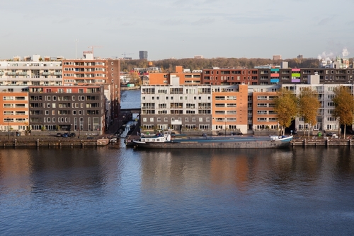 Residential area buildings and houses near waterfront line and river IJ- Netherlands, Amsterdam