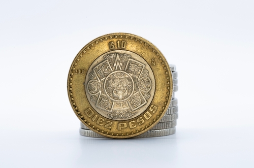 10 Mexican peso coin on a white background, money in Mexico